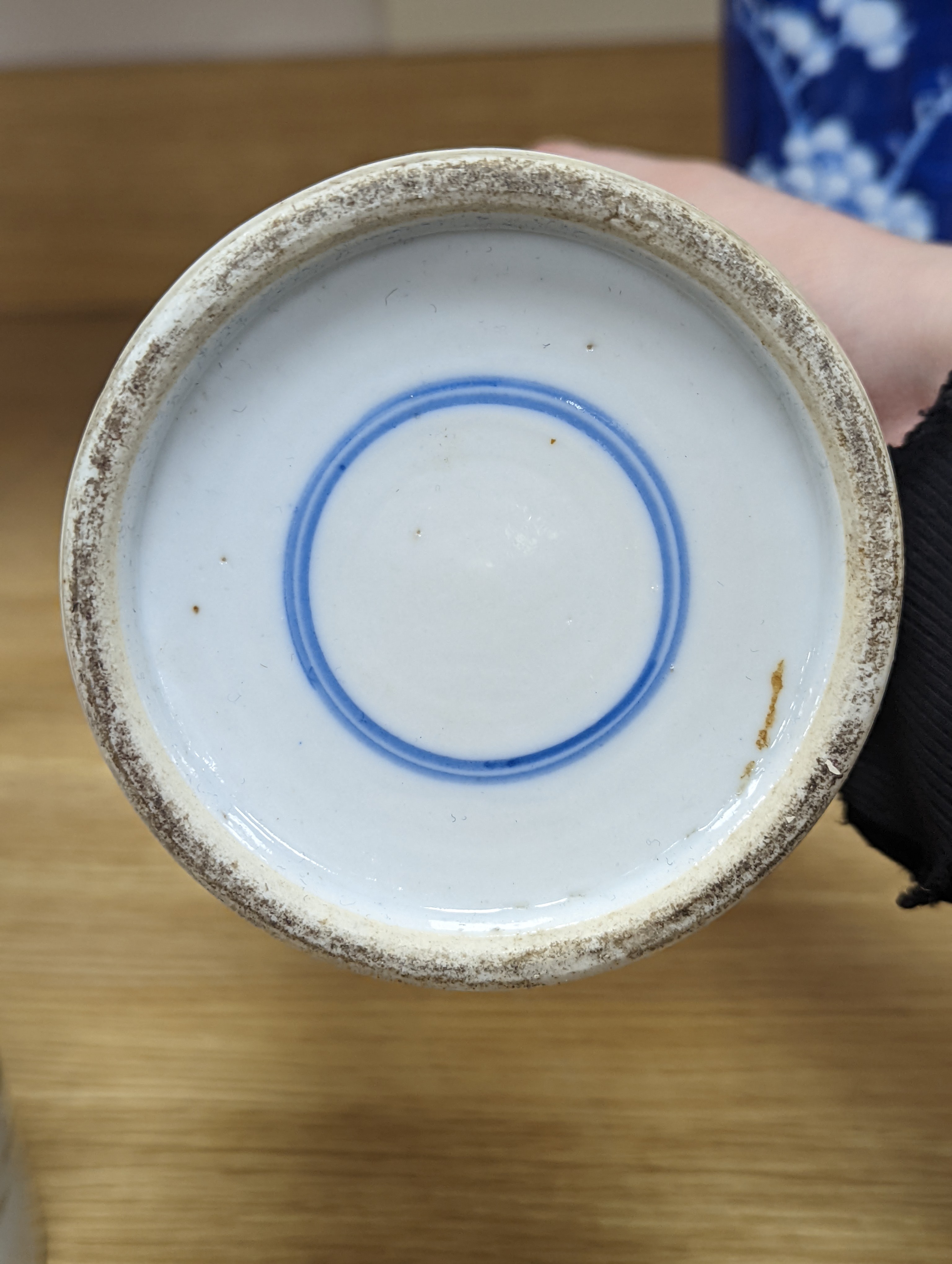 An 18th century Chinese famille rose mug, a Chinese Imari tea caddy and two Chinese blue and white sleeve vases 30cm (4)